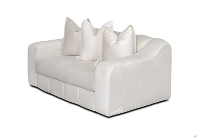 Bella 2 Seater Sofa Diagonal in Cream Velvet contrasting teddy scatter cushions